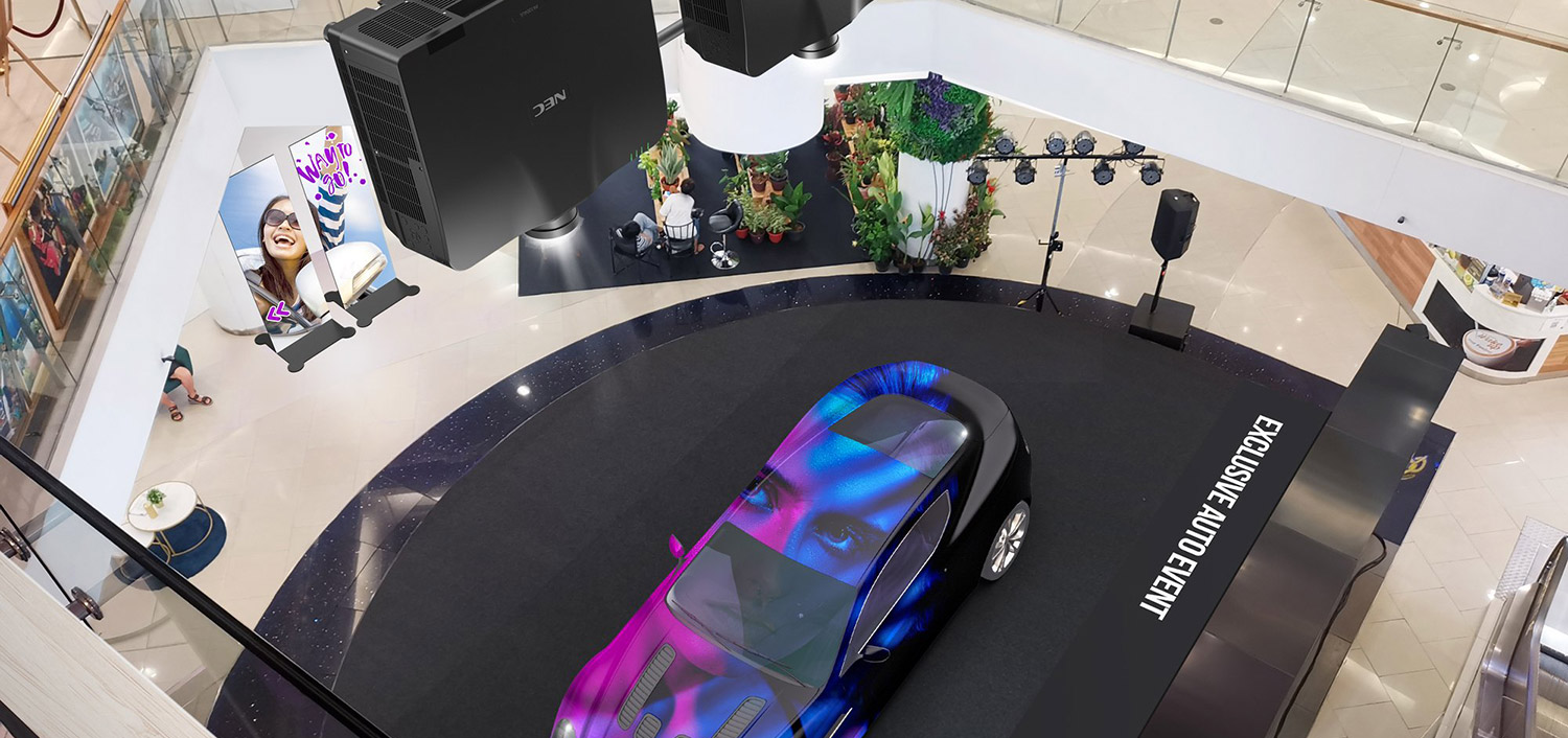 Laserprojektoren projizieren auf Auto an einer Ausstellung